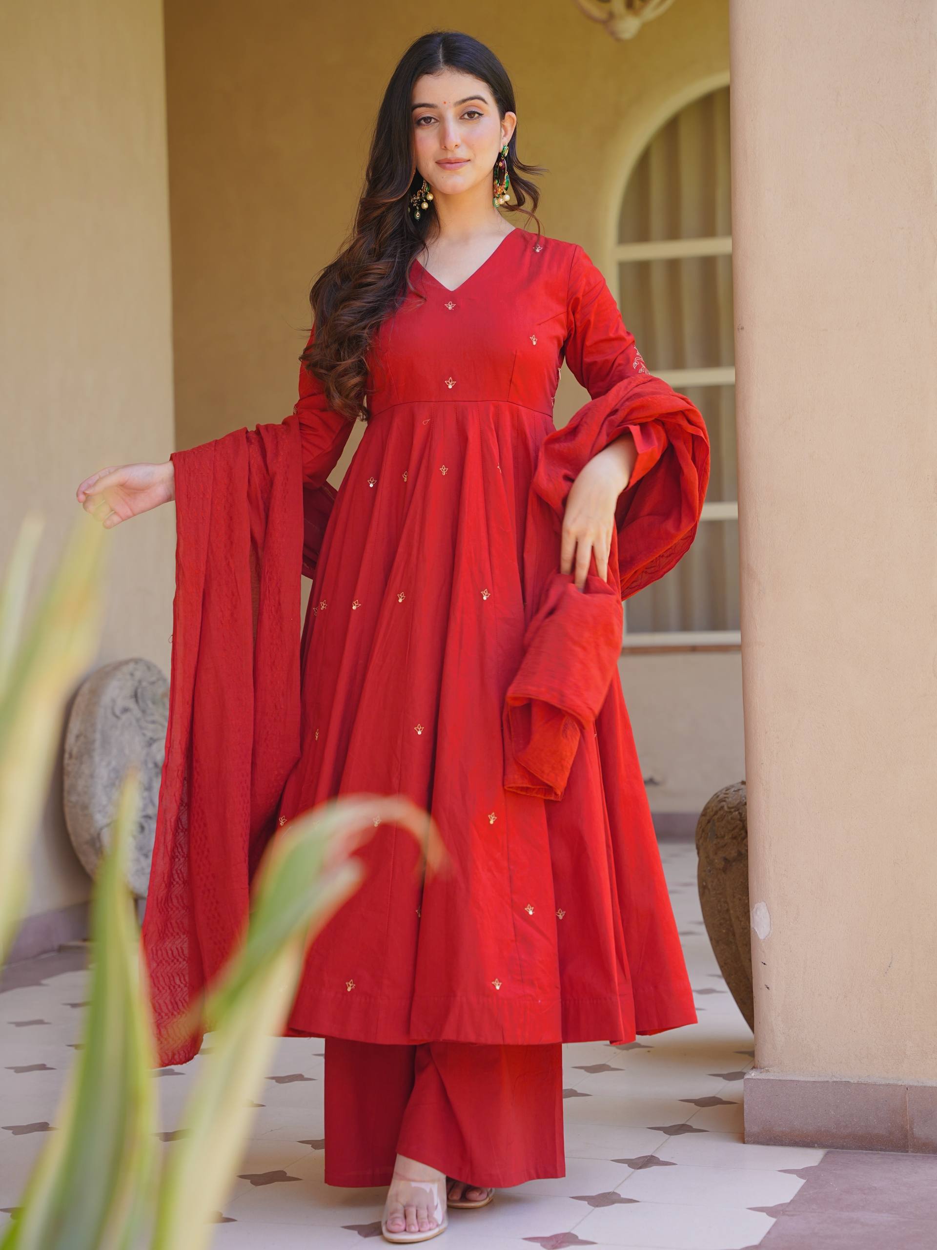 Rich Magenta Maroon Flared Anarkali Suit Set Adorned with Delicate Scattered Floral Embroidery and an Elegant V-Neckline